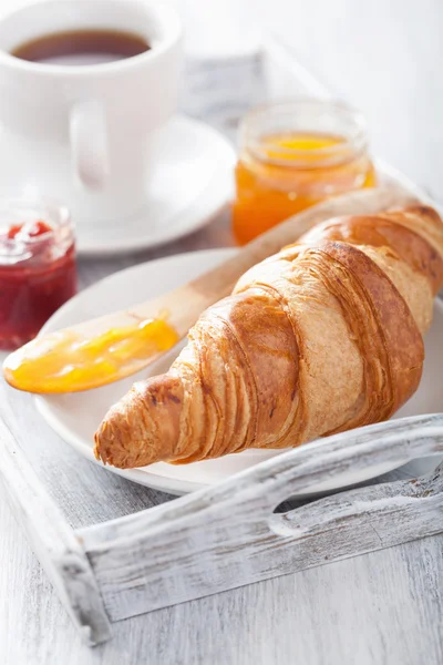 Fresh croissants with jam for breakfast on tray Stock Picture