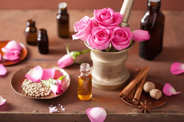 Spa and aromatherapy set with rose flowers mortar and spices — Stock Photo, Image