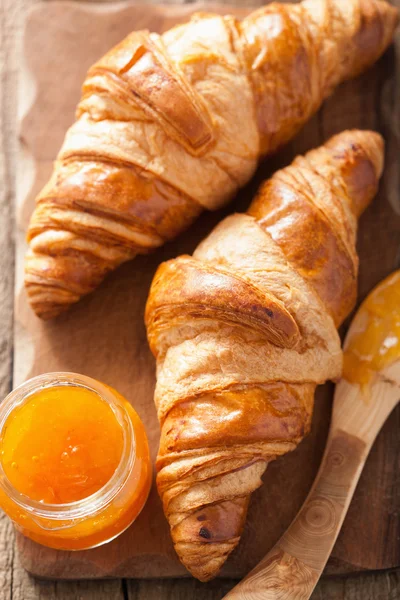 Fresh croissants with jam for breakfast — Stock Photo, Image