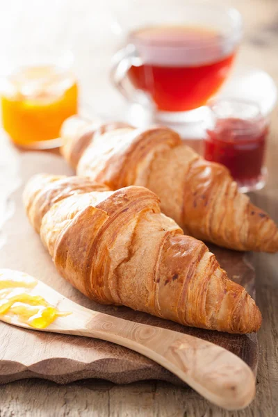 Fresh croissants with jam for breakfast — Stock Photo, Image