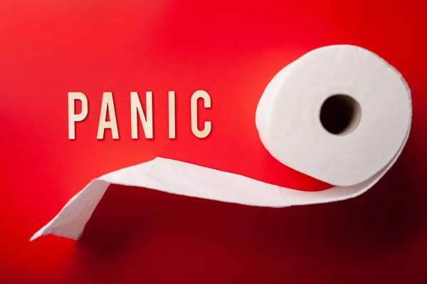 Panic Word Toilet Paper Text Wooden Letter Red Background — Fotografia de Stock