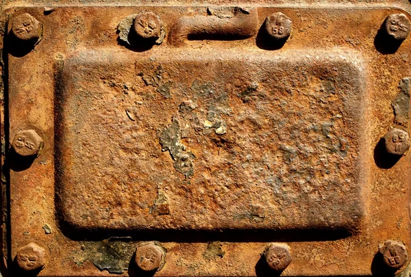 Stary zardzewiały metalowej pokrywy — Zdjęcie stockowe