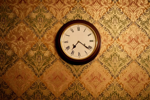 Vintage clock on a wall — Stock Photo, Image