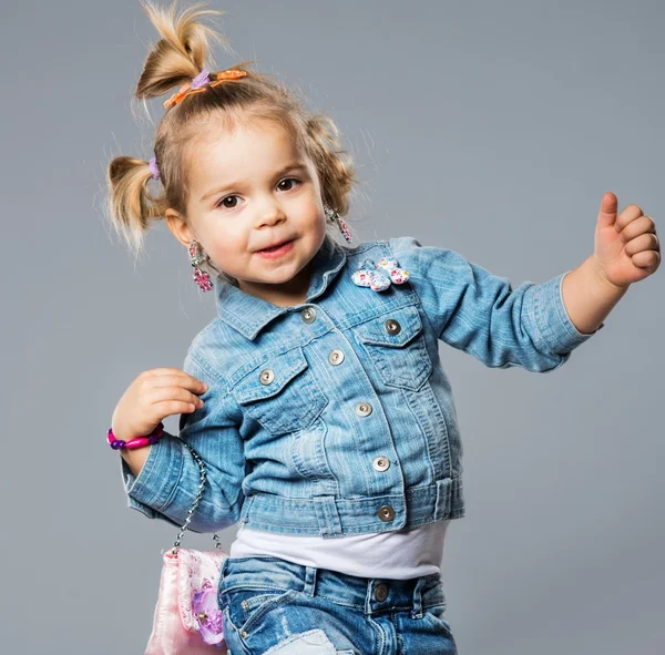 Funny little girl with small bag — Stock Photo, Image