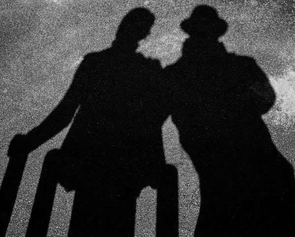 Two strangers shadows