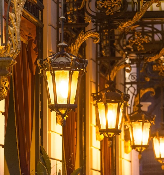 Beautiful street lanterns illuminated at night — Stock Photo, Image