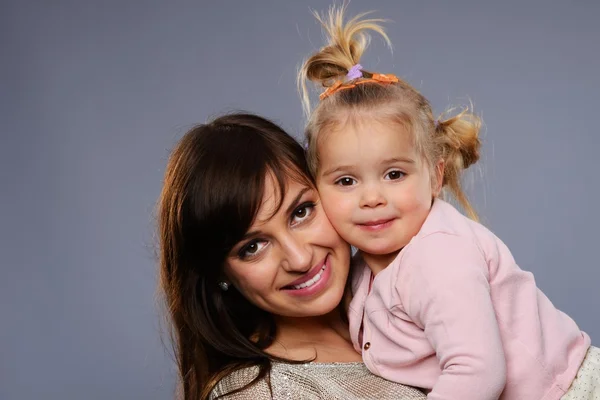 Mother holding her daughter — Stock Photo, Image