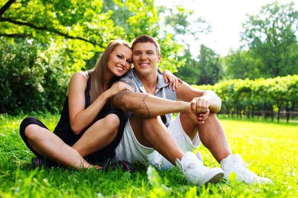 Beautiful sporty couple outdoors — Stock Photo, Image