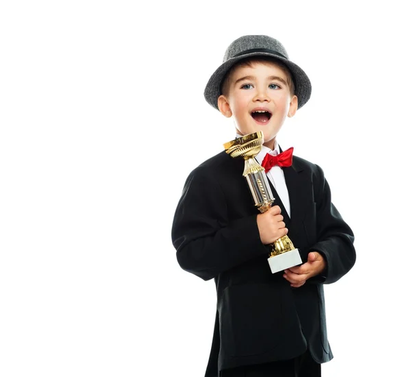 Boy holding prize cup — Stock Photo, Image