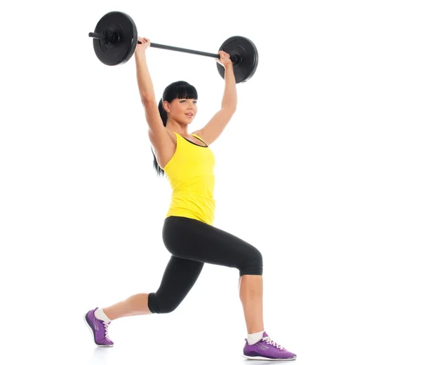Flicka liftings vikter — Stockfoto