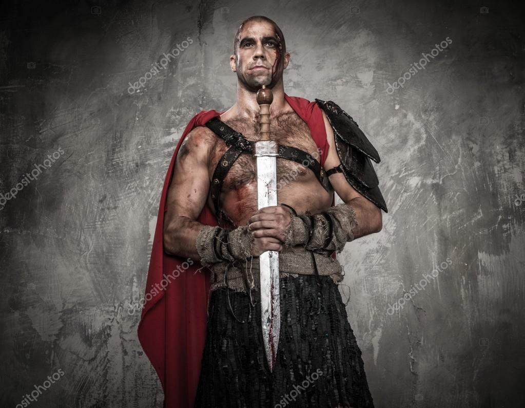 Gladiador con espada — Foto de stock #32767207 © nejron, image size:1023x794