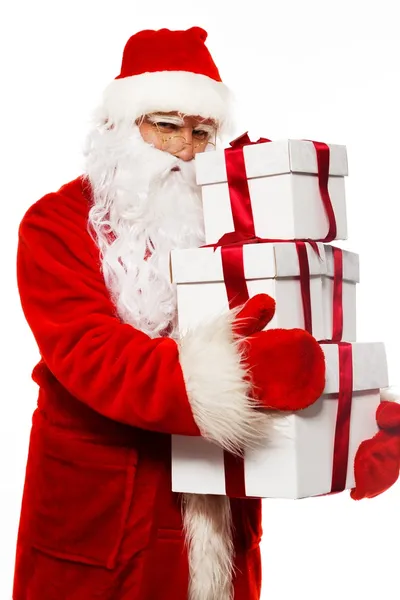 Santa Claus with gift boxes isolated on white background — Stock Photo, Image