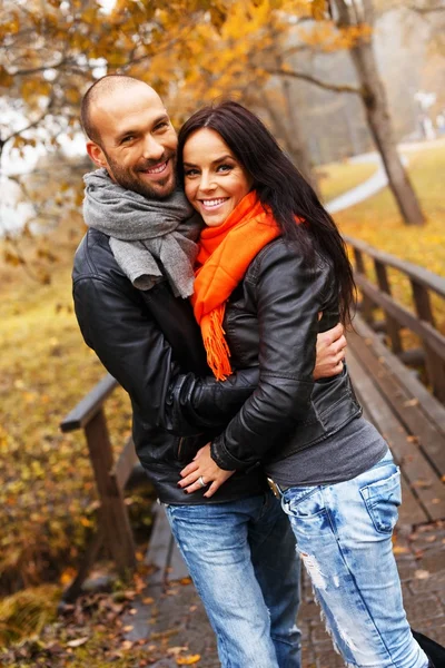 Happy middle-aged couple outdoors on beautiful autumn day — Stock Photo, Image