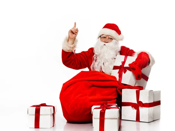 Santa Claus showing with gestures something isolated on white background — Stock Photo, Image