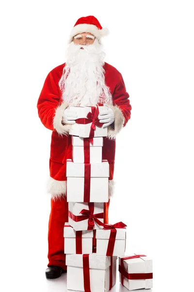 Santa Claus with gift boxes isolated on white background — Stock Photo, Image