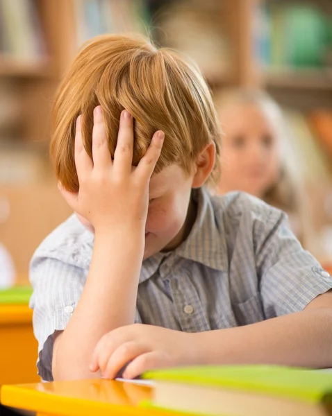 Funny redhead boy in school — Stock Photo, Image