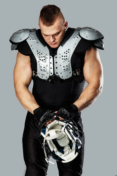 American football player with helmet and armour — Stock Photo, Image