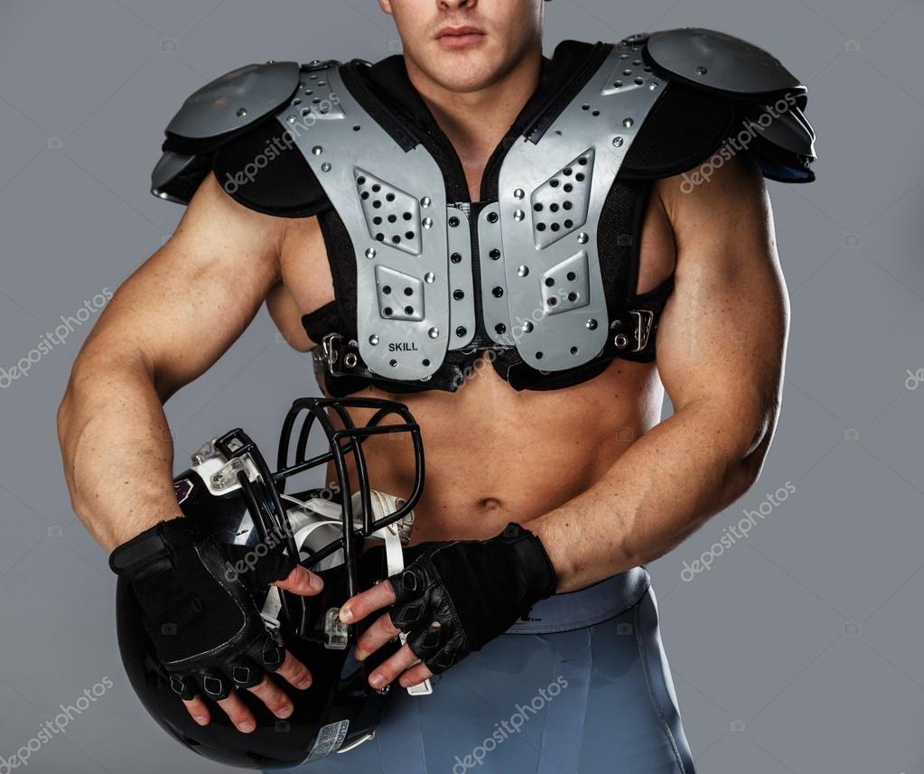 American football player with helmet and armour — Stock Photo © nejron