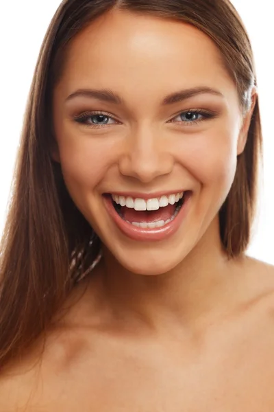 Young positive brunette girl with beautiful smile Stock Photo