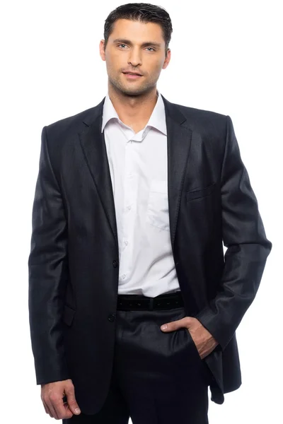 Csinos, fiatal férfi fekete öltöny és a fehér ing, elszigetelt fehér background — Stock Fotó