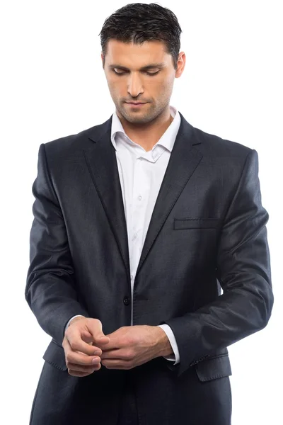 Bonito jovem em terno preto e camisa branca isolado no fundo branco — Fotografia de Stock