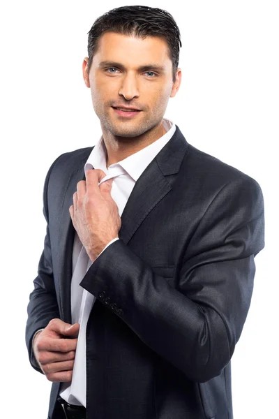 Hombre joven guapo en traje negro y camisa blanca aislada sobre fondo blanco —  Fotos de Stock