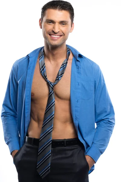 Beau homme sexy en chemise bleue et pantalon noir — Photo