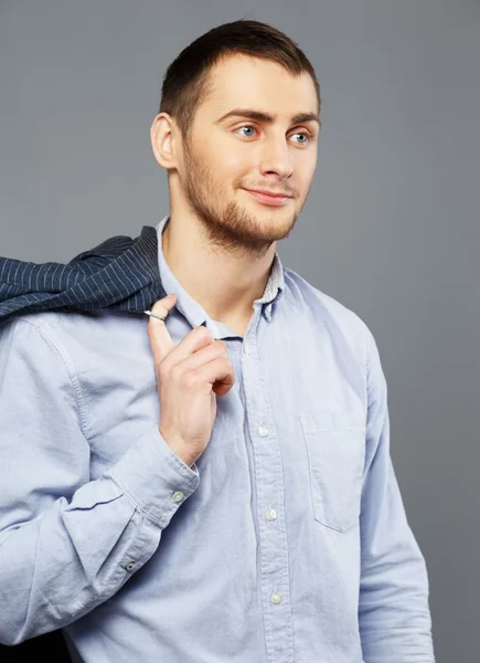 Joven guapo con camisa azul — Foto de Stock