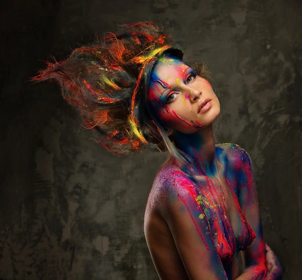 Young woman muse with creative body art and hairdo — Stock Photo, Image