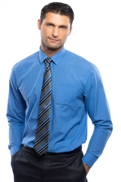 Handsome young man in blue shirt and tie isolated on white background — Stock Photo, Image