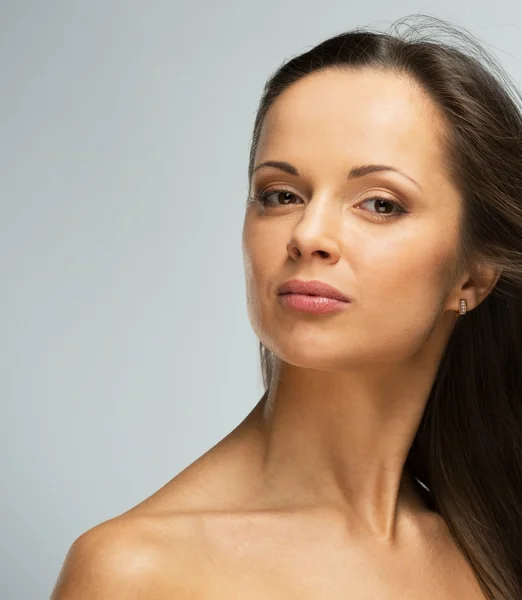 Cheerful beautiful young brunette woman with brown eyes and long hair — ストック写真