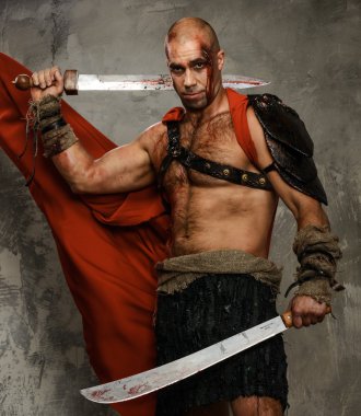 Wounded gladiator with two swords covered in blood clipart