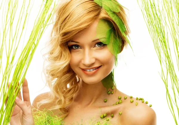 Beautiful young woman in conceptual spring costume — Stock Photo, Image