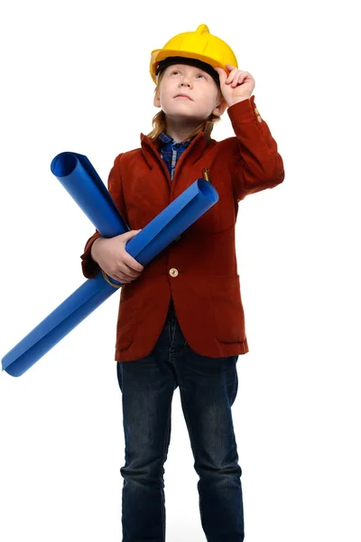 Мальчик с планами и инструментами, играющий роль инженера — стоковое фото