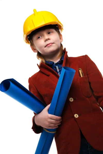 Malý chlapec s plány a nástrojů hraje roli inženýra — Stock fotografie
