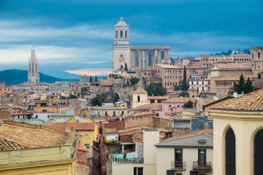 Cathedral view over rooftops of old town Girona, Spain clipart