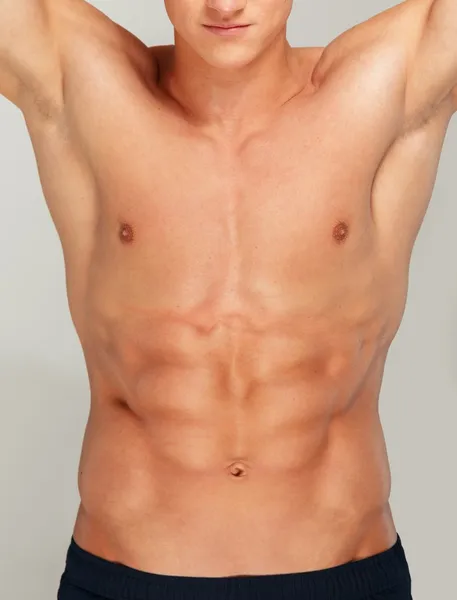 Young man's muscular torso — Stock Photo, Image