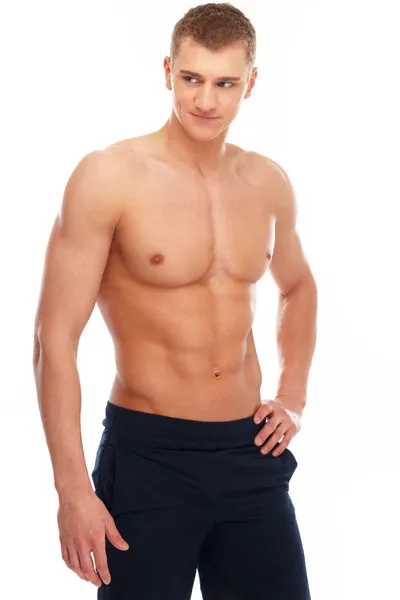 Schöner junger Mann mit muskulösem Oberkörper — Stockfoto