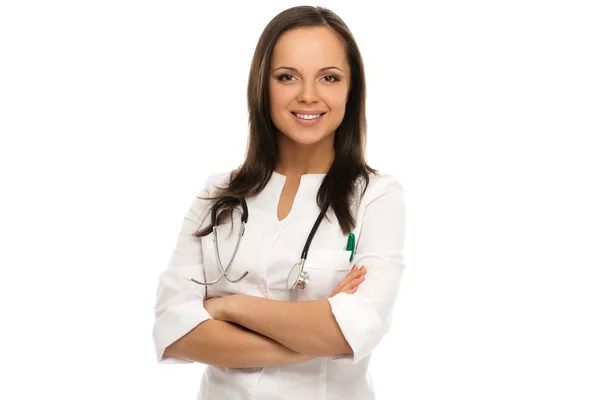 Young positive brunette doctor woman isolated on white — Stock Photo, Image