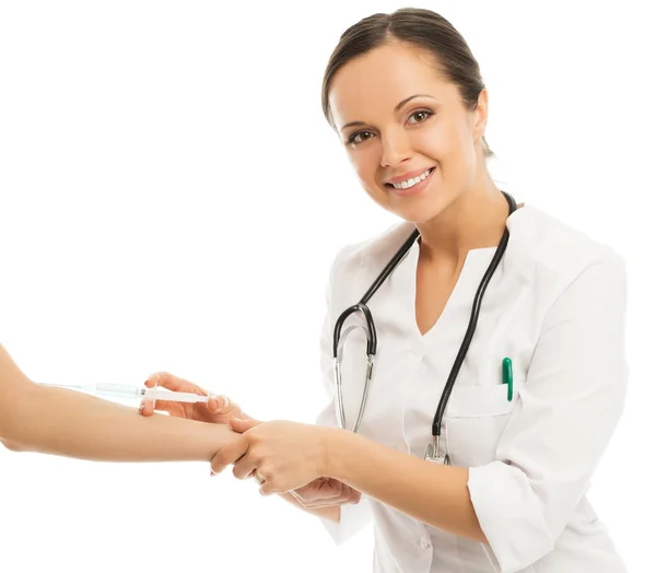 Young positive brunette doctor woman making injection with syringe — Stock Photo, Image