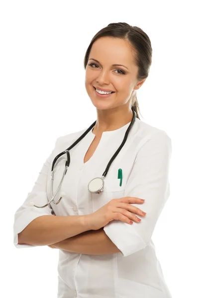 Young positive brunette doctor woman isolated on white — Stock Photo, Image