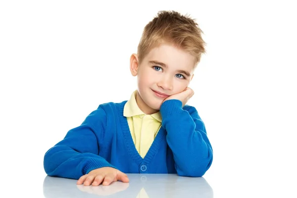 Cheerful little boy in blue cardigan and yellow shirt — Stock Photo, Image