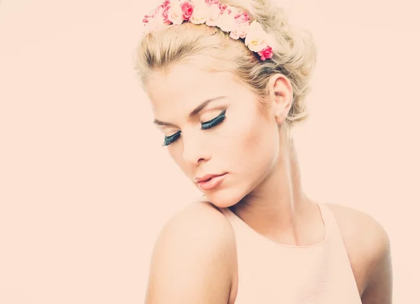 Beautiful young dreaming woman with chaplet — Stock Photo, Image