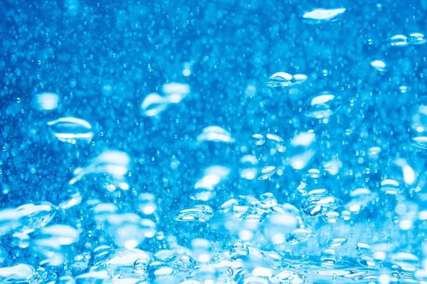 Tło niebieskie wody z bąbelkami — Zdjęcie stockowe