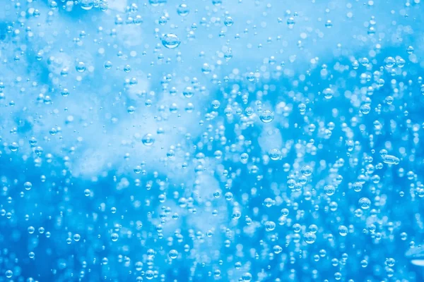 Водний фон з бульбашками — стокове фото