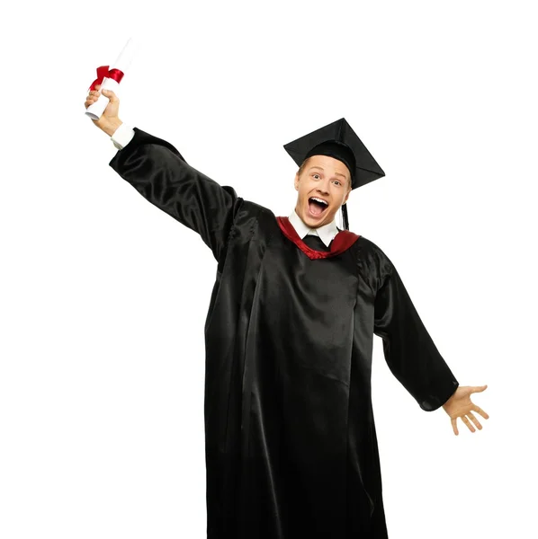 Смешной счастливый молодой выпускник, изолированный на белом — стоковое фото