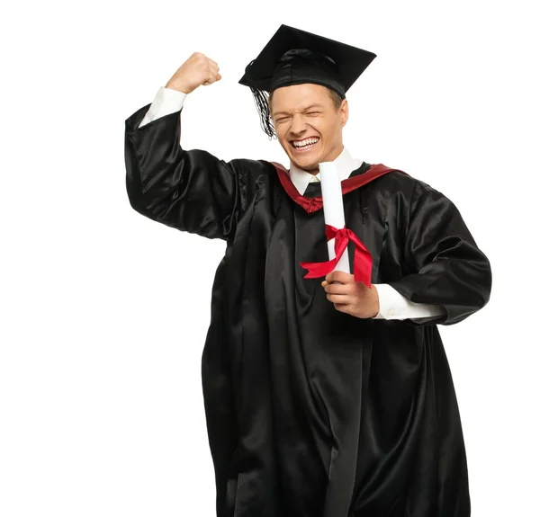 Zabawny zadowolony młody student absolwent mężczyzna na białym tle — Zdjęcie stockowe