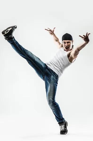 Homem dançarino mostrando break-dance movimentos isolados no branco — Fotografia de Stock