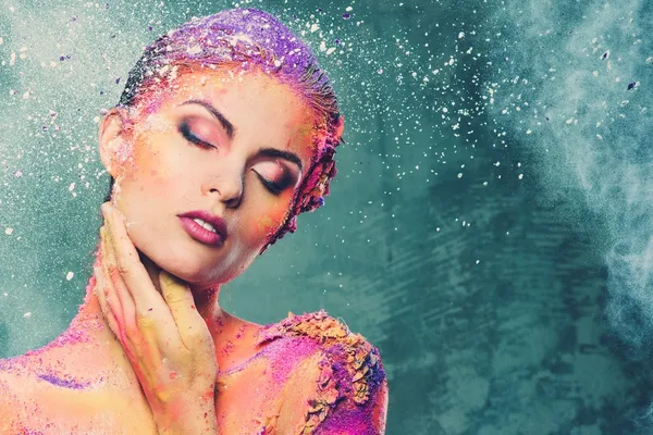 Beautiful young woman with conceptual colourful body art — Stock Photo, Image