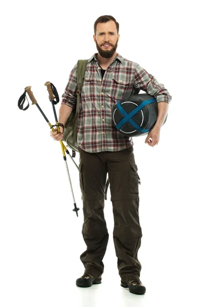 Traveler with backpack, hiking poles and sleeping bag — Stock Photo, Image